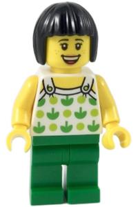 Ludo Green Female Minifigure - Female minifigure with black short hair, wearing a white top with green apples and lime dots, and green legs - twn350