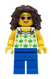 Beach Tourist Minifigure - Female beach tourist with dark brown hair wearing a white top with green apples and lime dots, and blue legs - twn462