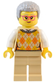 Female Natural History Museum visitor in a tan knit argyle sweater vest, tan legs, light bluish gray coiled hair, and glasses - twn491