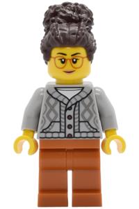 Tudor House Inn Owner Minifigure - Owner of Tudor House Inn with light bluish gray knit cable cardigan sweater, dark orange legs, and dark brown coiled hair with bun - twn514