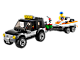 SUV with Watercraft thumbnail